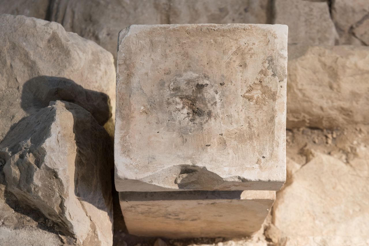 The top of the shorter altar had the burnt remains of cannabis and animal dung.