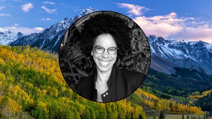 Dr. Ayana Elizabeth Johnson headshot; she&#039;s wearing glasses against a backdrop of yellow trees and snowcapped mountains