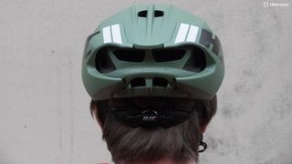 A height adjustable clickwheel works to adjust the helmet's tension