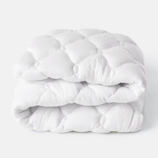 Helix Plush Mattress Topper against a white background.