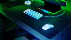 Razer Viper V2 Pro review: mouse on a desk with other peripherals