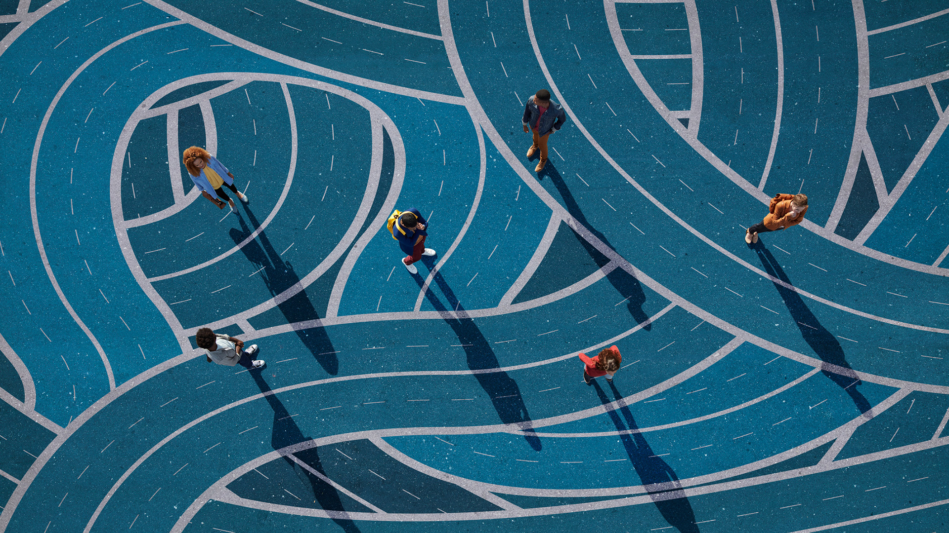 An illustration showing employees from above, walking on intersecting blue roads to represent friction-maxxing and workflow friction.