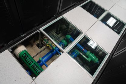 A water cooling system at the San Diego Supercomputer Center at the University of California San Diego. MIT researchers are using the 'Comet' supercomputer to develop an artificial intelligence (AI) approach to detect electron correlation