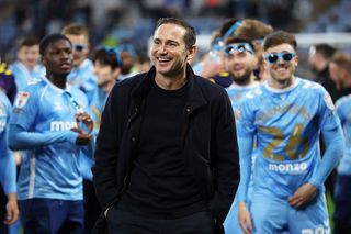 COVENTRY, ENGLAND - APRIL 21: Frank Lampard, Manager of Coventry City, celebrates becoming champions with his players after the Sky Bet Championship match between Coventry City and Portsmouth at The Coventry Building Society Arena on April 21, 2026 in Coventry, England. (Photo by Dan Mullan/Getty Images)