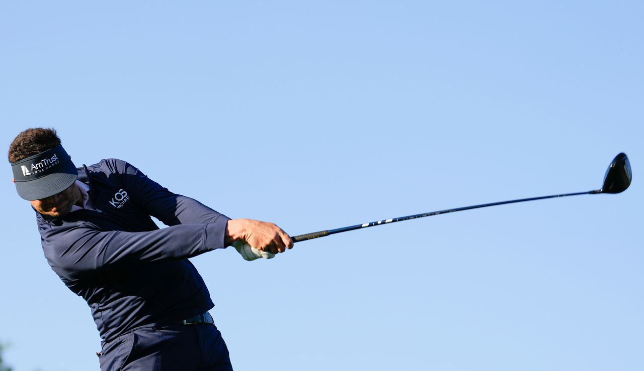 Beau Hossler strikes a tee shot with his driver 