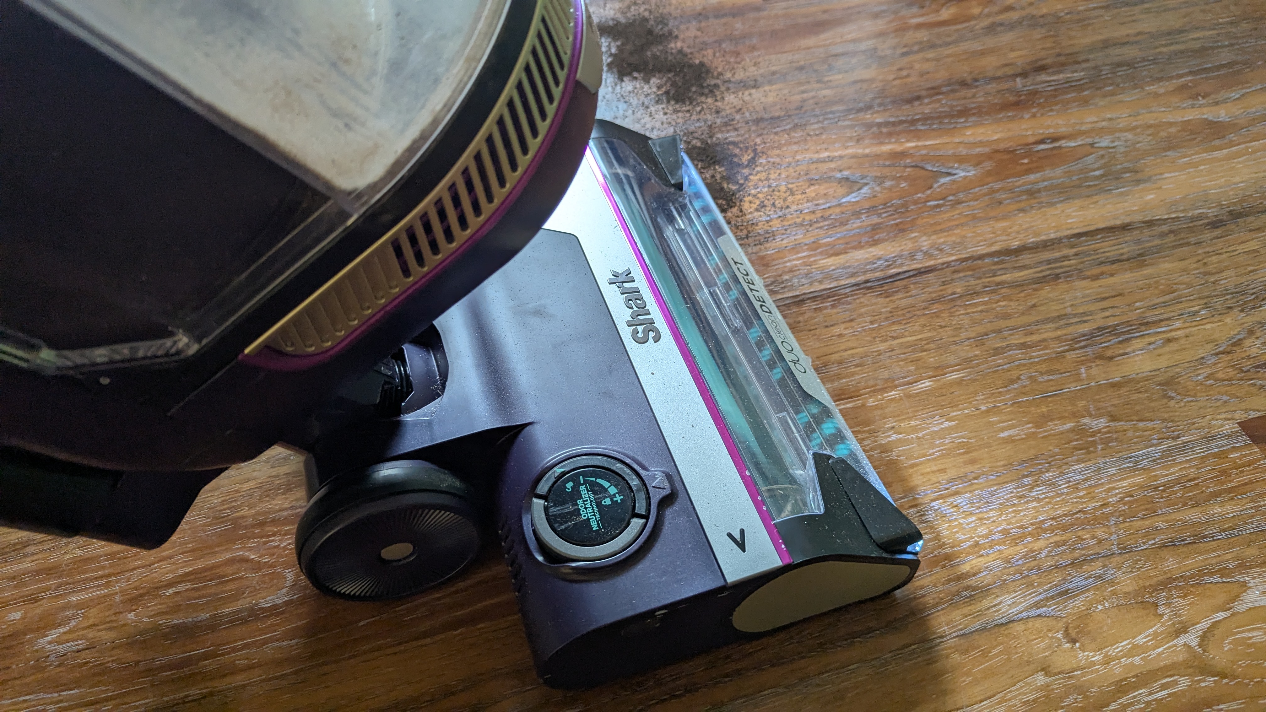 Shark PowerDetect Upright vacuum performing suction tests on hard floor