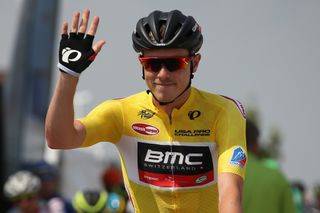 Race leader Rohan Dennis (BMC) give a wave from the start line