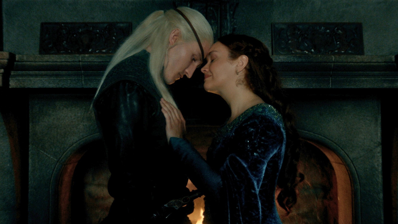 Aemond and Alicent holding hands and placing their forehead against the other's in House of the Dragon season 3