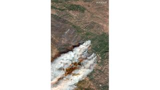 A satellite image shows the massive plumes of the Kincade fire on Oct. 27. 