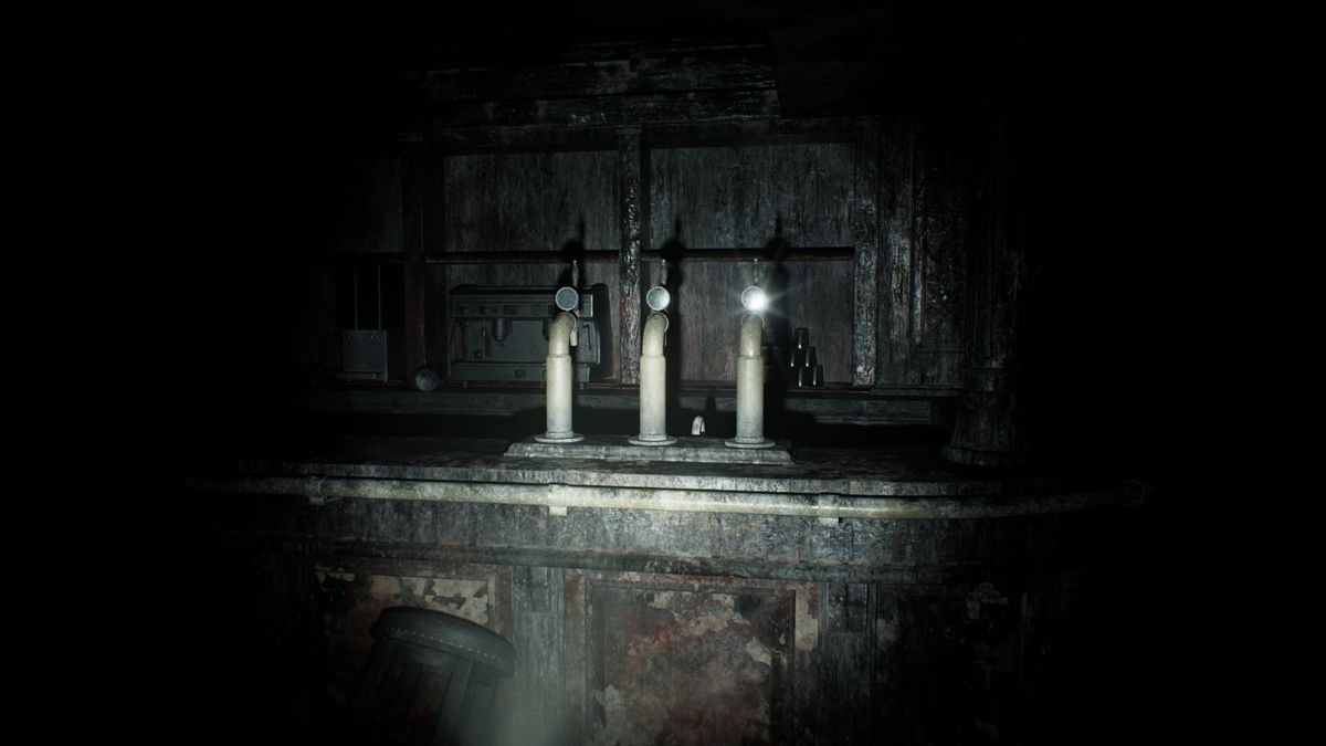 Resident Evil Requiem screenshot of flashlight gleaming off chome bar taps in dark.