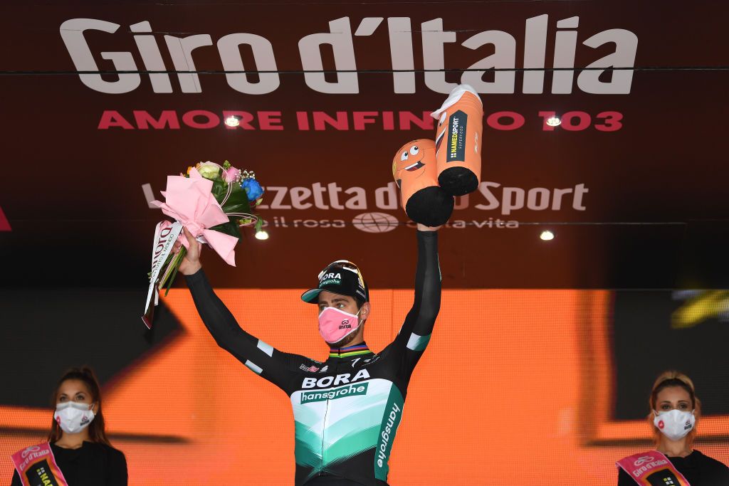 TORTORETO ITALY OCTOBER 13 Podium Peter Sagan of Slovakia and Team Bora Hansgrohe Celebration Flowers Miss Hostess during the 103rd Giro dItalia 2020 Stage 10 a 177km stage from Lanciano to Tortoreto girodiitalia Giro on October 13 2020 in Tortoreto Italy Photo by Tim de WaeleGetty Images