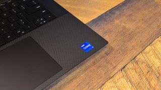 The palm rest of the Dell XPS 15 2022 with a Intel Core i7 sticker