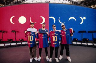 Coldplay members stand with their Barcelona shirt