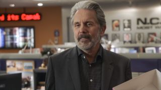 Gary Cole&#039;s Alden Parker smiling while holding pastry box in NCIS