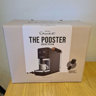 Hotel Chocolat Podster in a box on a wooden table