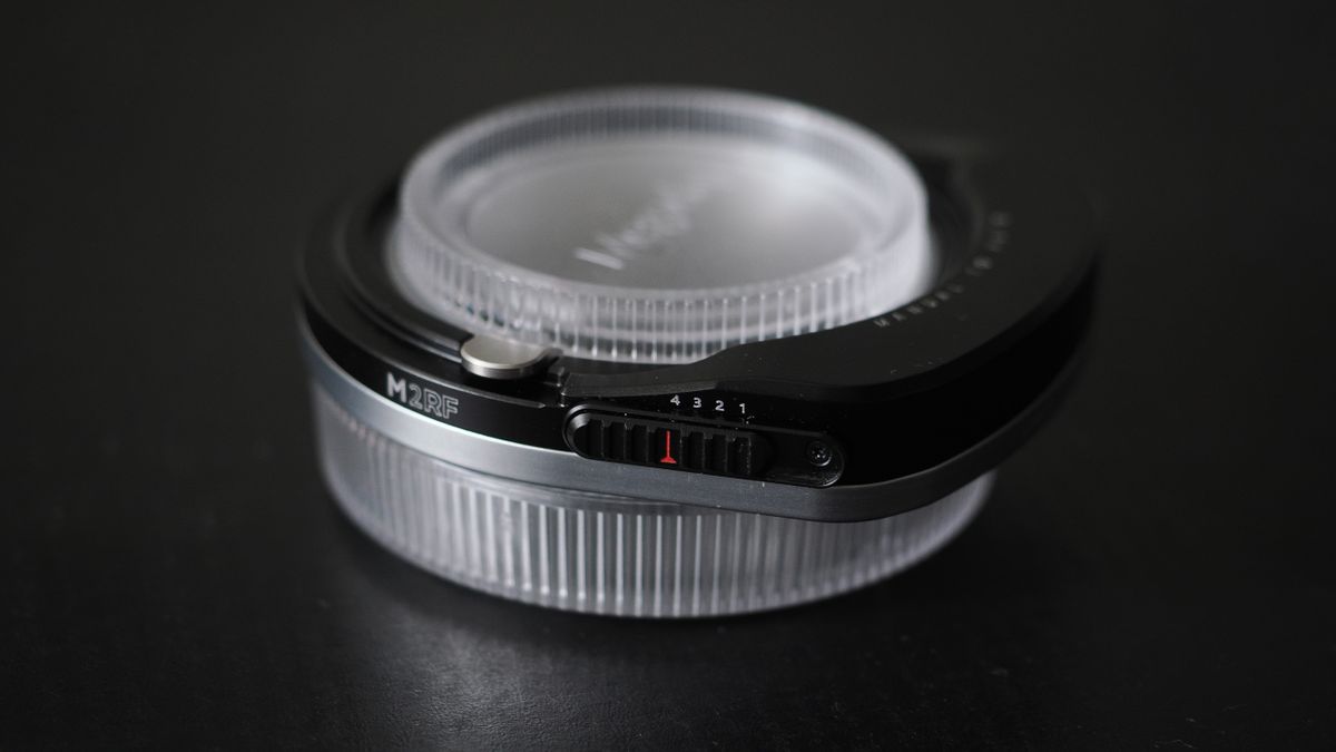 Megadap M2RF adapter on a black surface