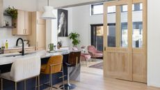 A large kitchen with seating area