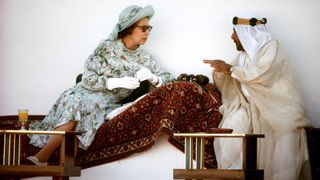 The Queen Talking With The Emir Of Bahrain (amir) During Horse Racing And Camel Racing In Bahrain