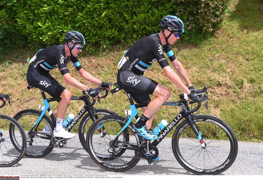 Chris Froome is surrounded by his Team Sky teammates