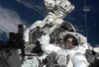 Shuttle Astronauts Upgrade Station in Spacewalk