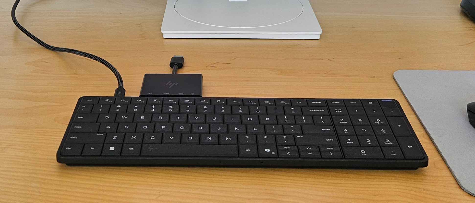 The HP EliteBoard G1a on a desk