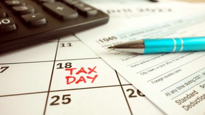 picture of a tax form on a calendar with April 18 marked as "tax day"
