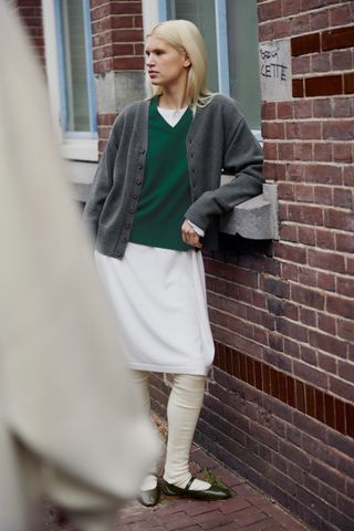 Model on street wearing layered extreme cashmere