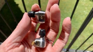Campfire Audio Solaris Stellar Horizon just earbuds, no cable, held in hand