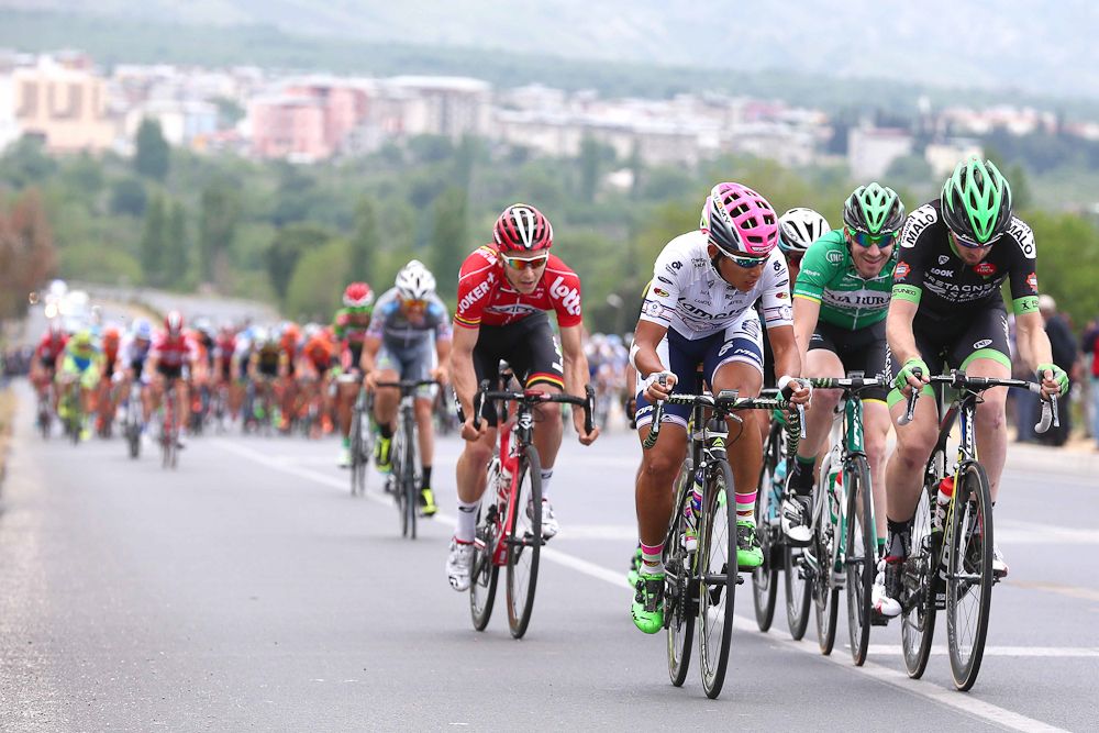 Riders try to escape the peloton