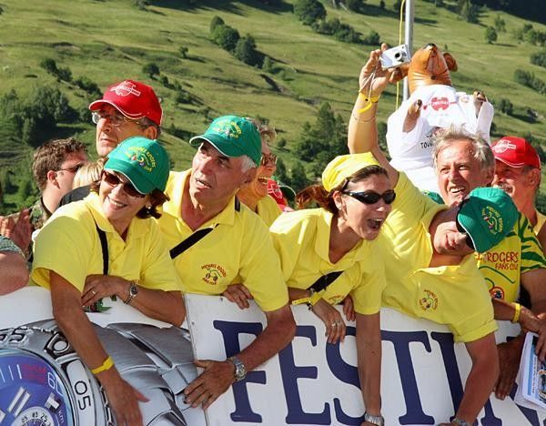 The Michael Rogers fan club cheers on their man, whose group's about 15 seconds away.