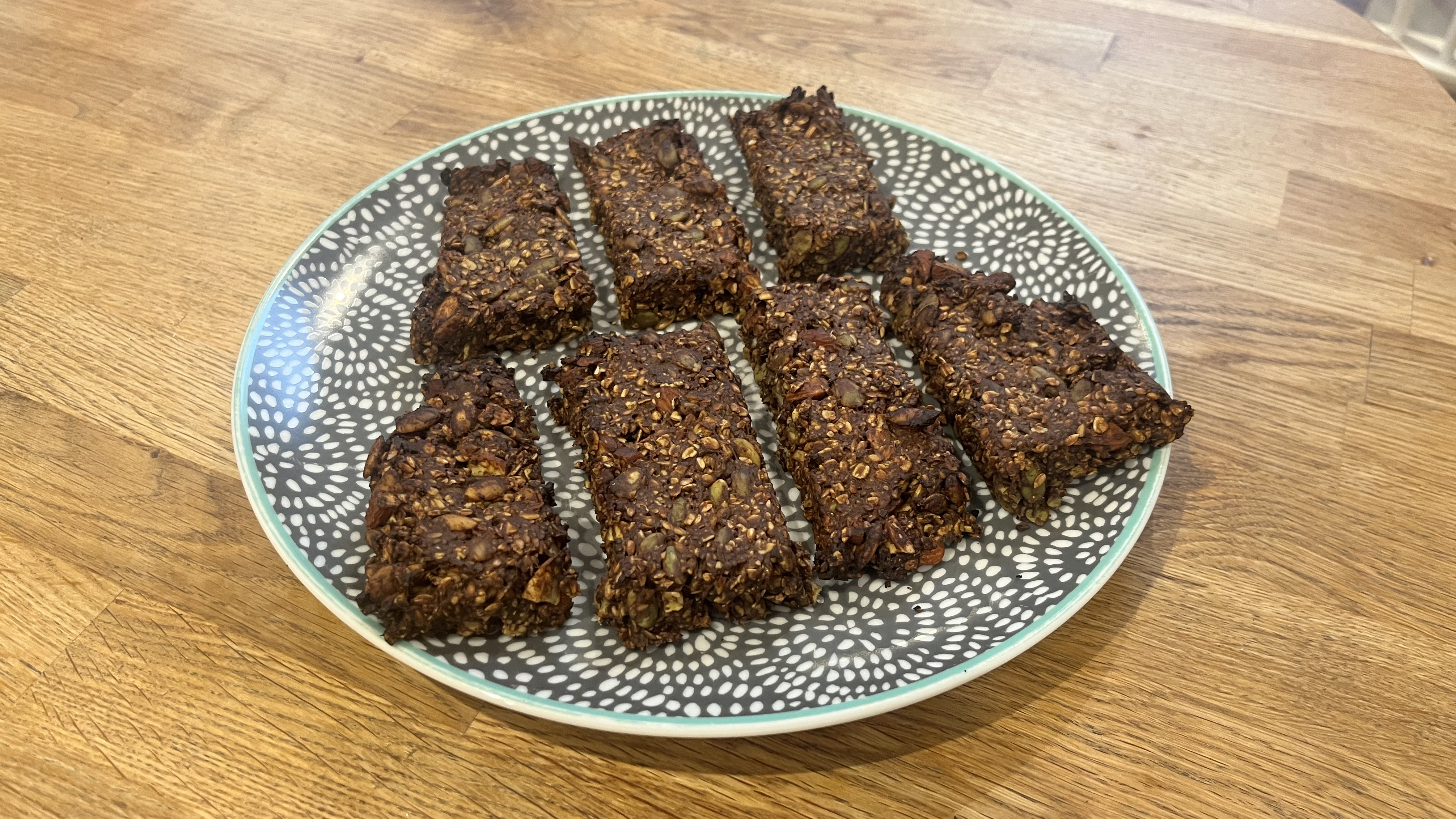 Plate of seven misshapen granola bars