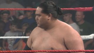 Yokozuna in the middle of WWE ring