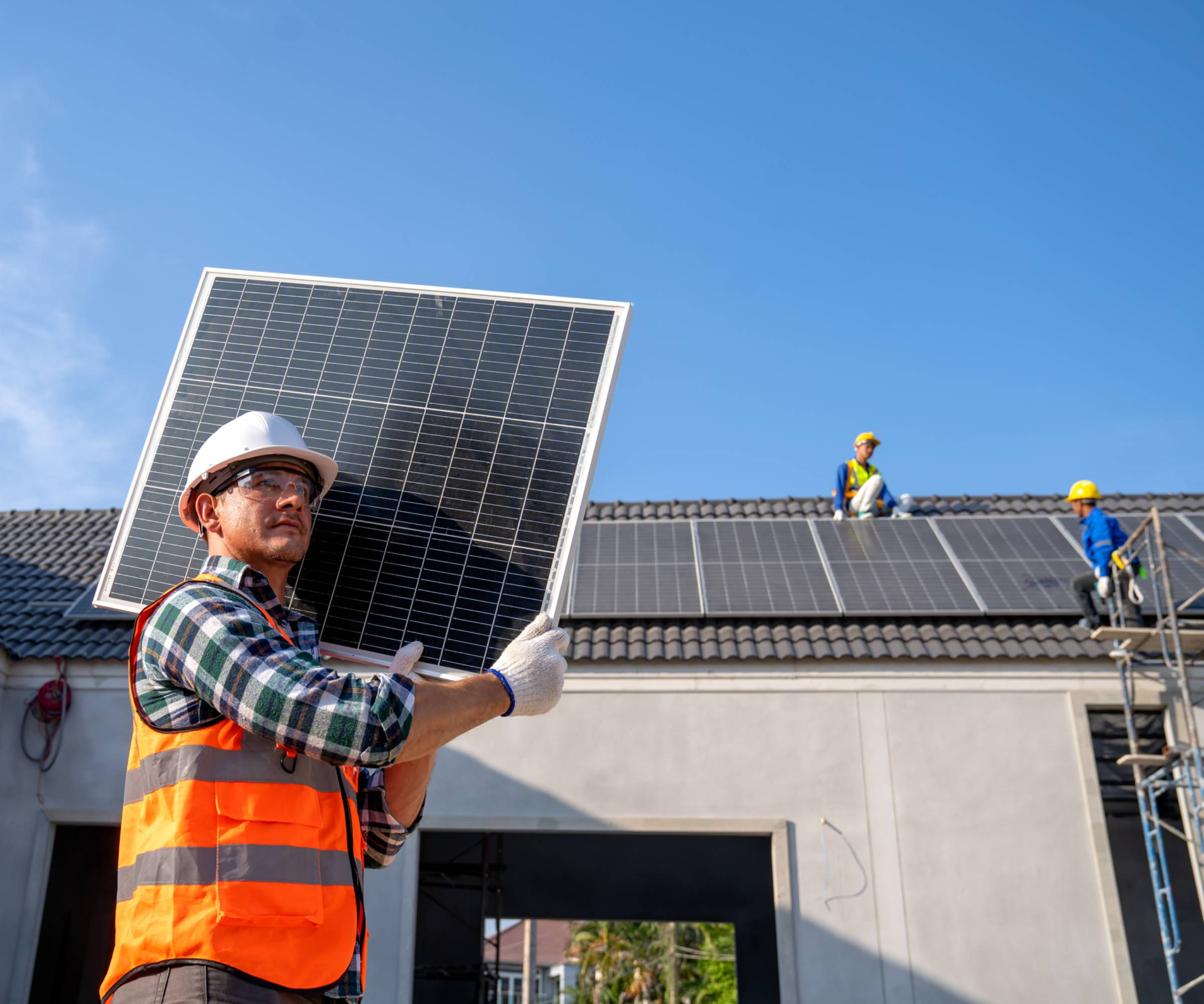 solar panels being installed on roof