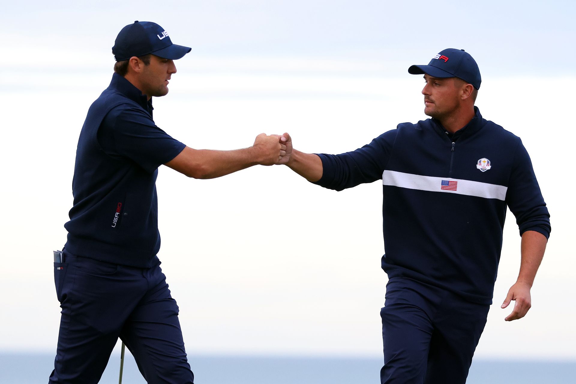 Bryson DeChambeau and Scottie Scheffler fist bump at the 2021 Ryder Cup