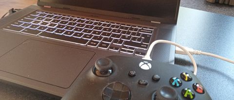 Acer Chromebook 516 GE review; a close up of a gaming laptop keyboard with an Xbox controller 