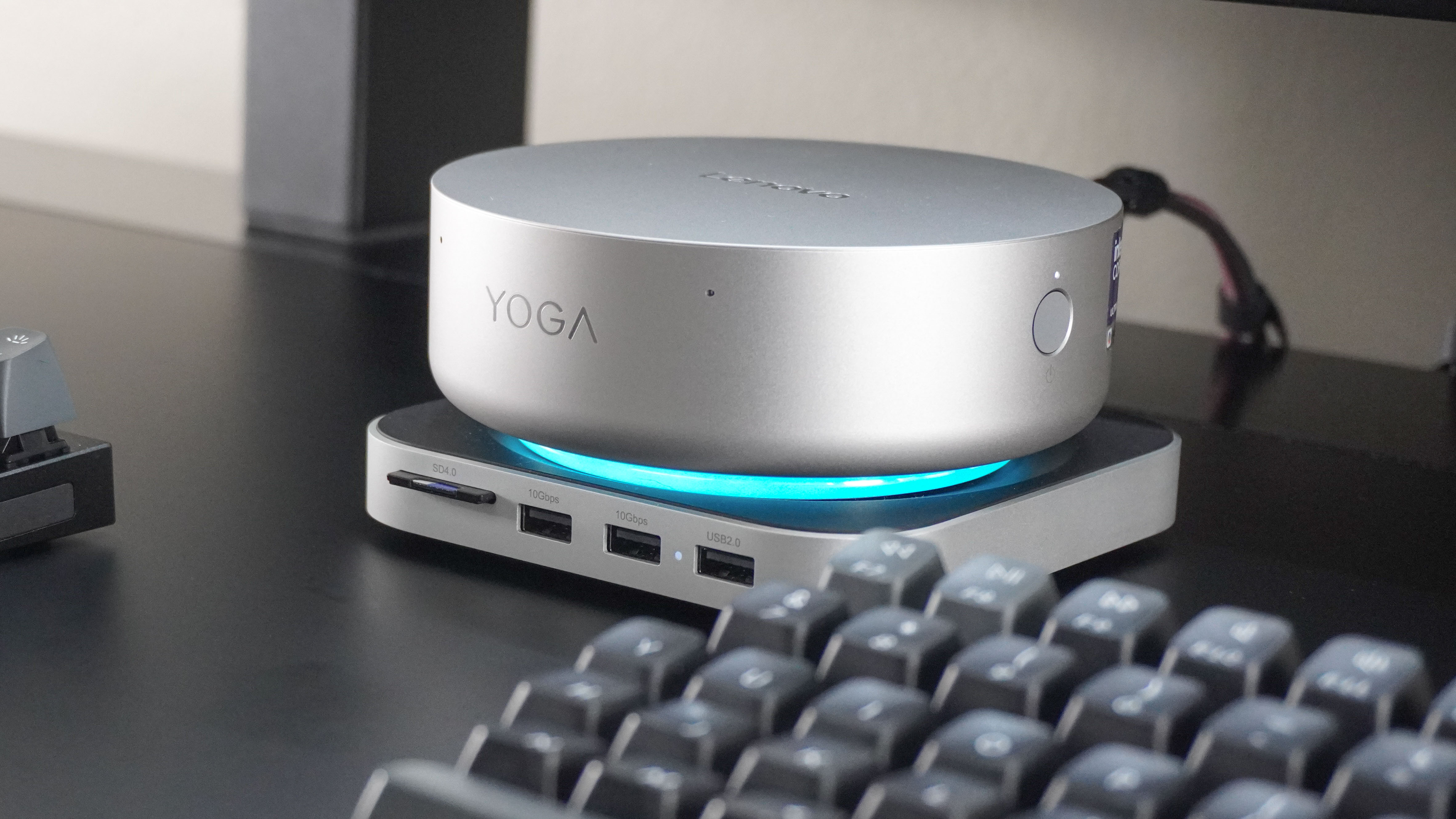 The Lenovo Yoga Mini on top of Satechi's Mac Mini M4 Stand &amp;amp; Hub on a desk