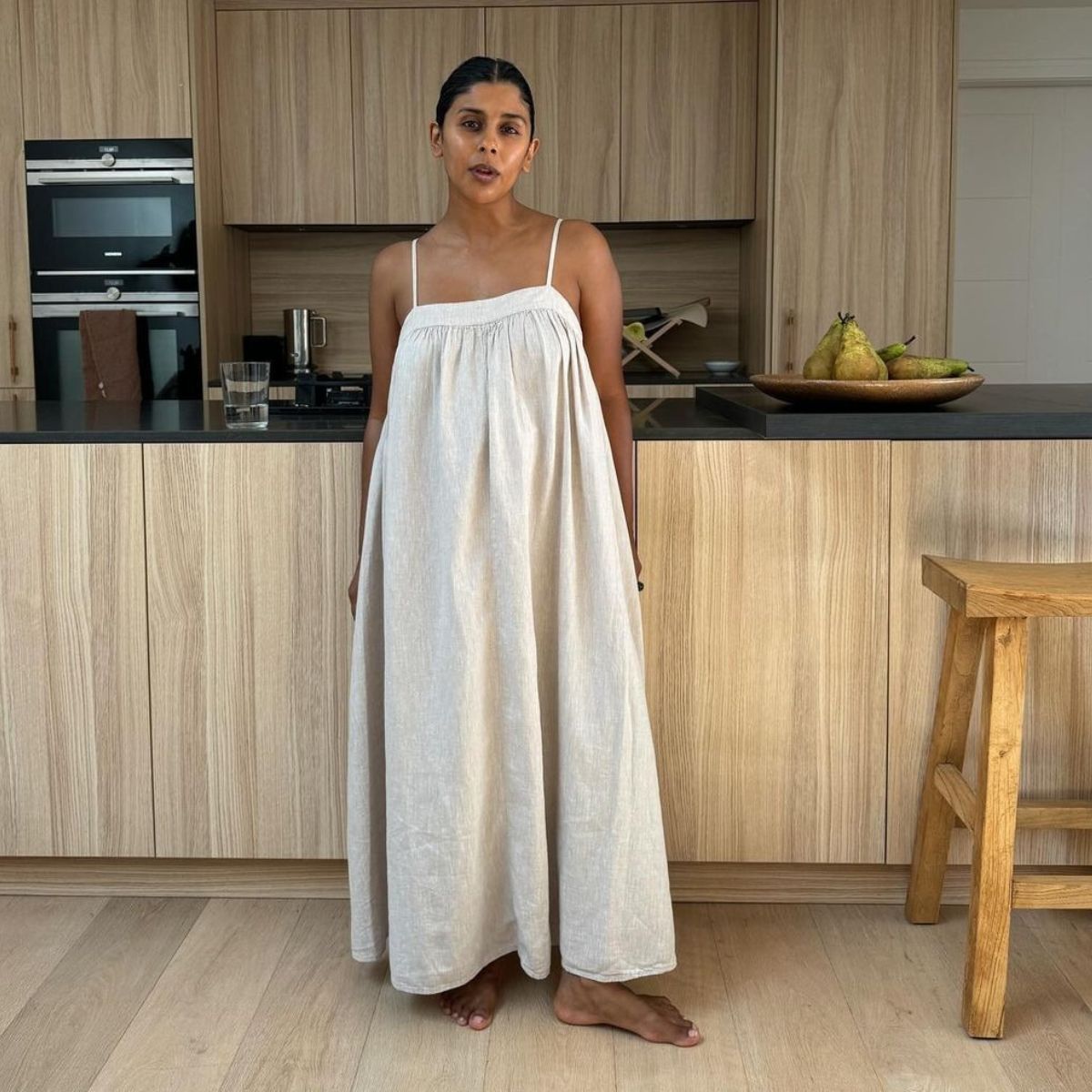 Monikh wearing petite m&amp;S dress