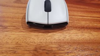 closeup front of white gaming mouse