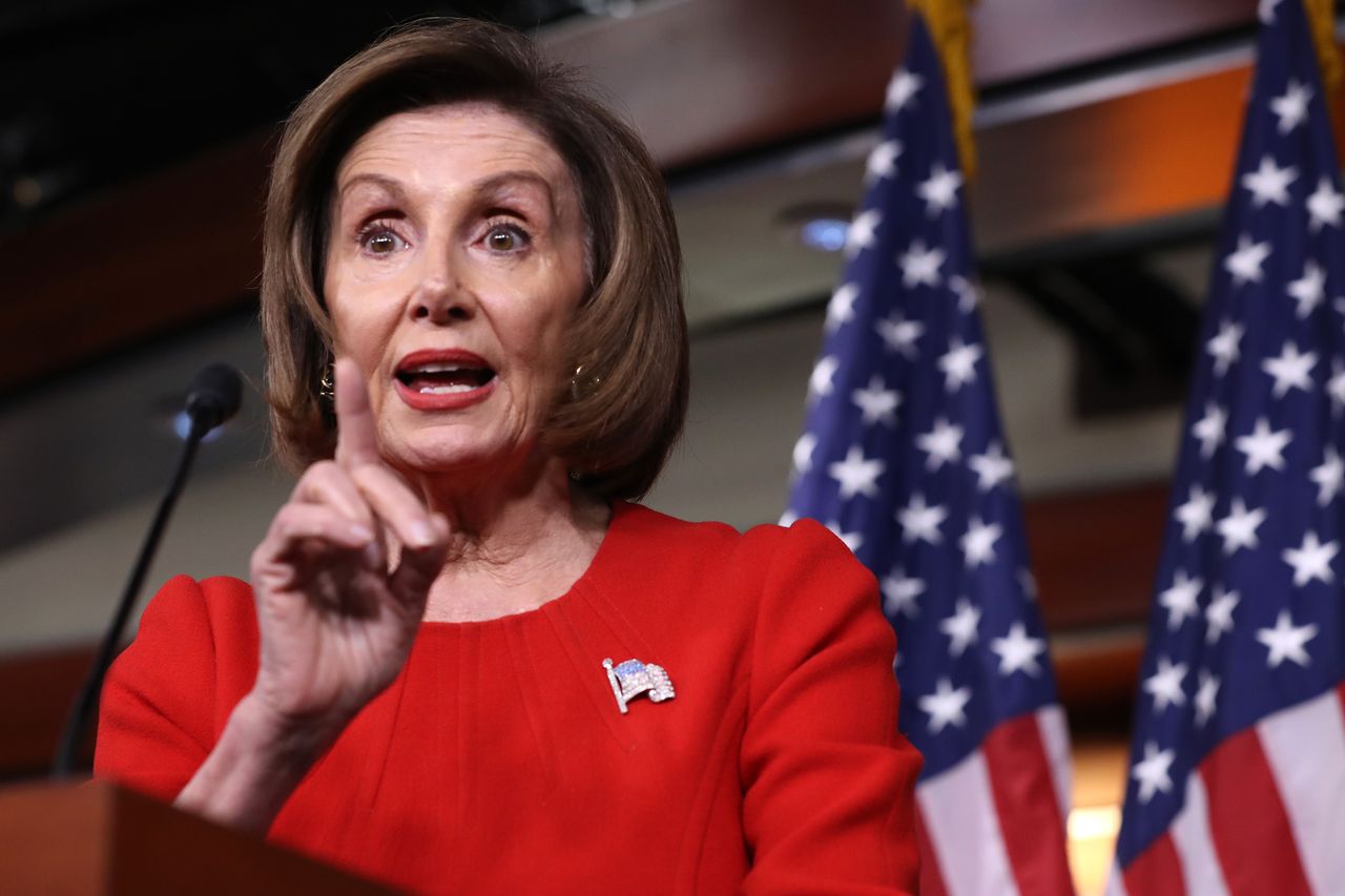 Nancy Pelosi speaking to the press