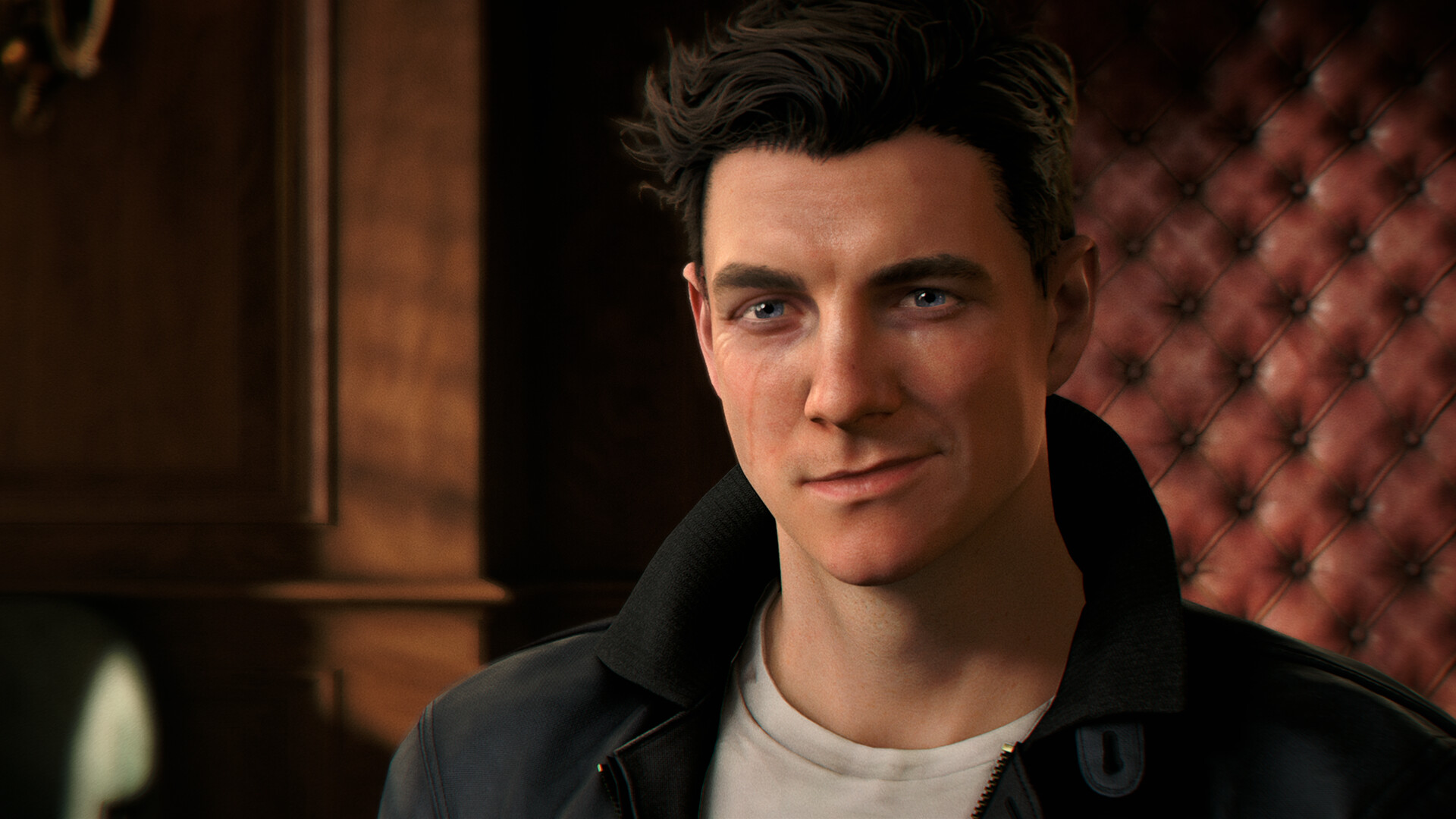 A male animated character with short, dark hair smirks confidently. He wears a black jacket over a white shirt, set against a warmly lit, leather-paneled wall.
