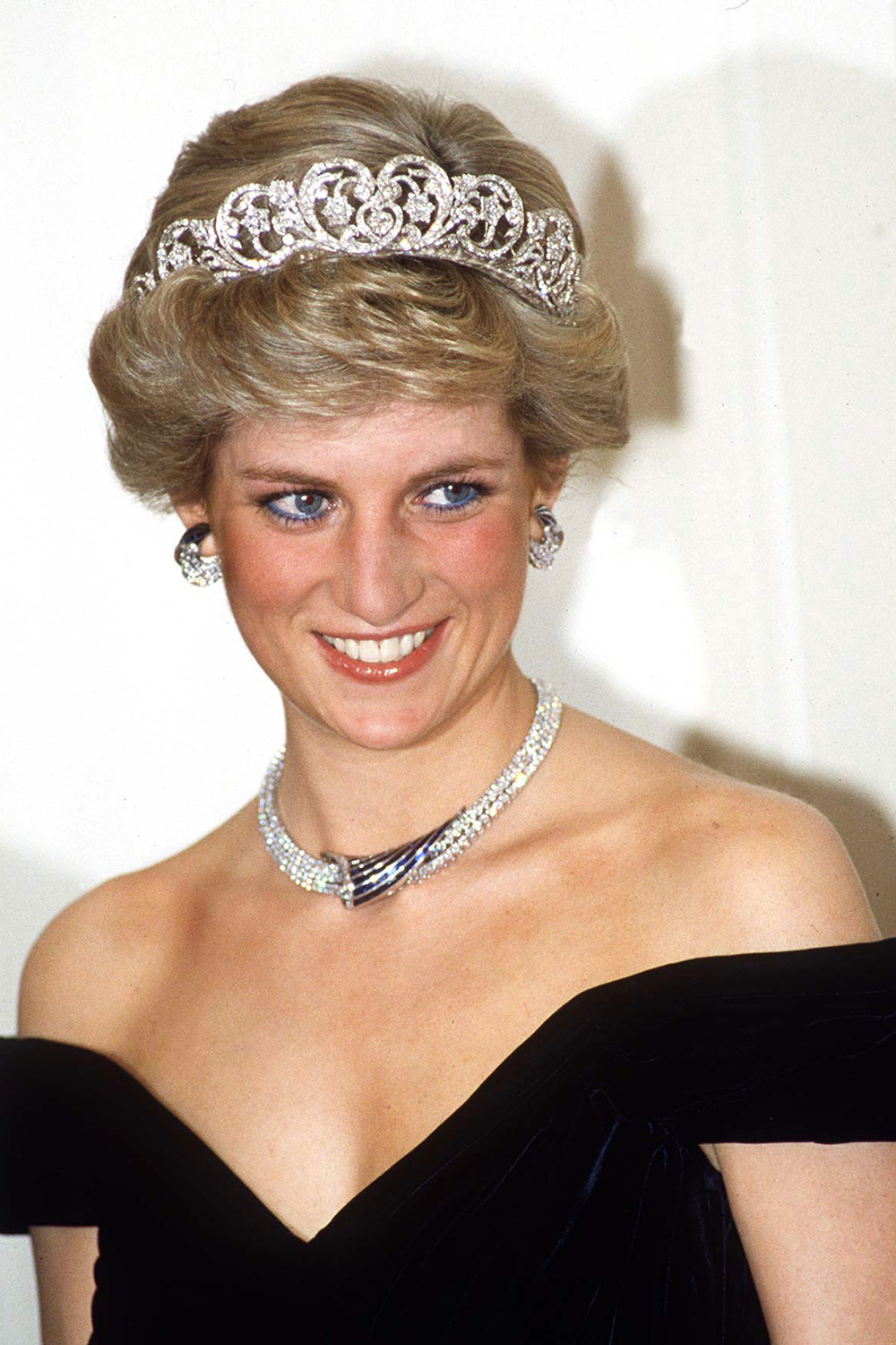 Princess Diana in Germany wearing sapphire and diamond jewels