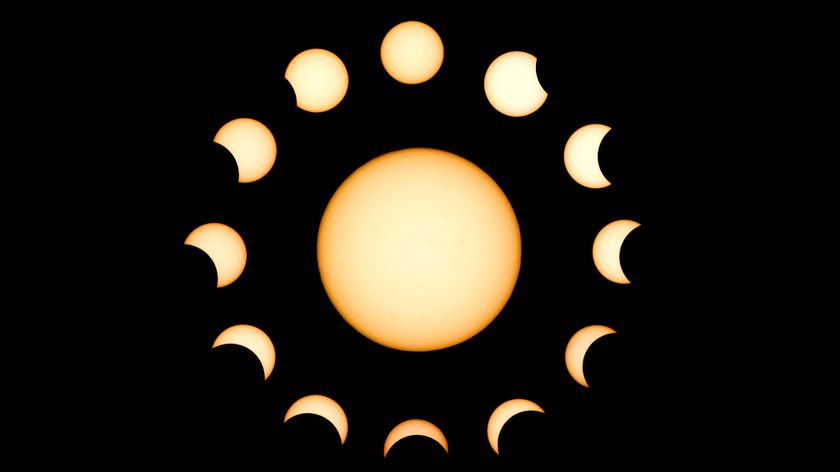composite image of a partial solar eclipse showing the full sun in the middle surrounded by a circle of solar images during each stage of a partial solar eclipse.