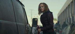 Peppermint Jennifer Garner Standing Next To A Van