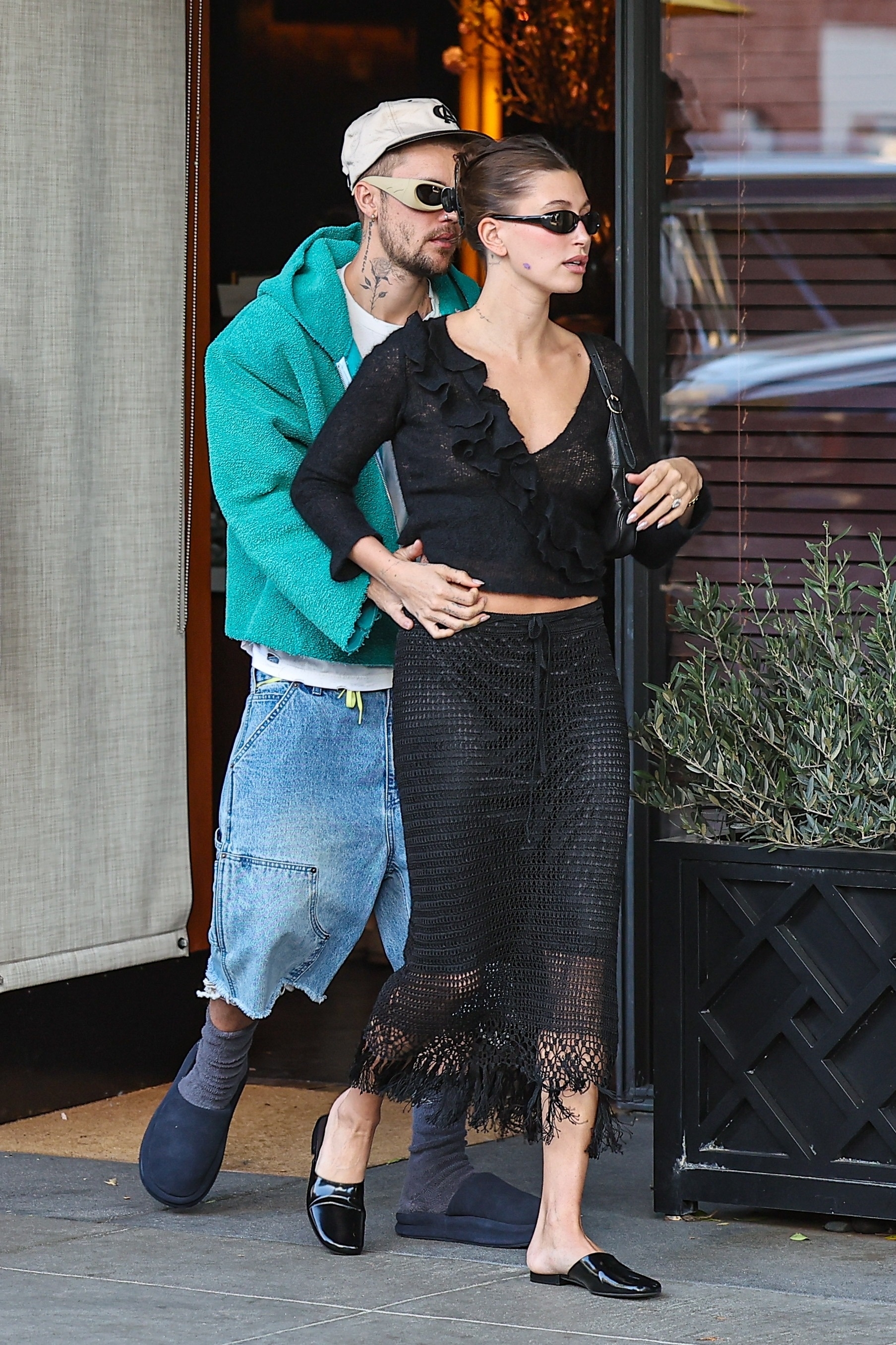 Hailey Bieber styled the mules trend with a crochet matching set in March 2026