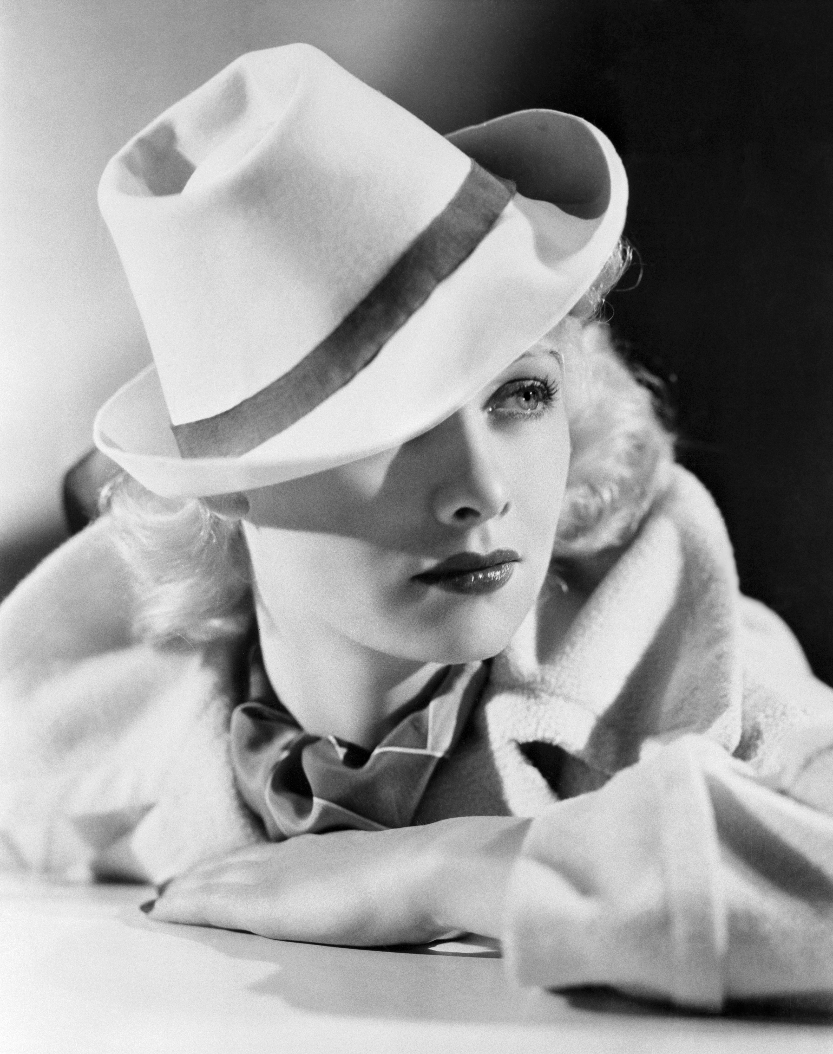 black and white photo of Lucille Ball wearing a fedora