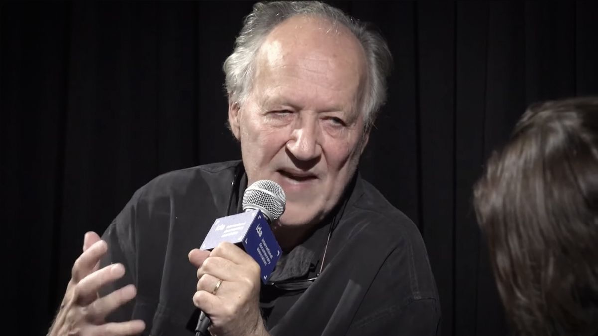 Werner Herzog being interviewed on stage by the International Documentary Association (IDA)