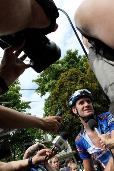 Rory Sutherland is surrounded by the media after his stage win