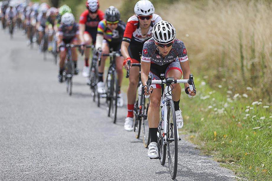 Shannon Malseed works hard on the front of the main group in pursuit of the strong break away