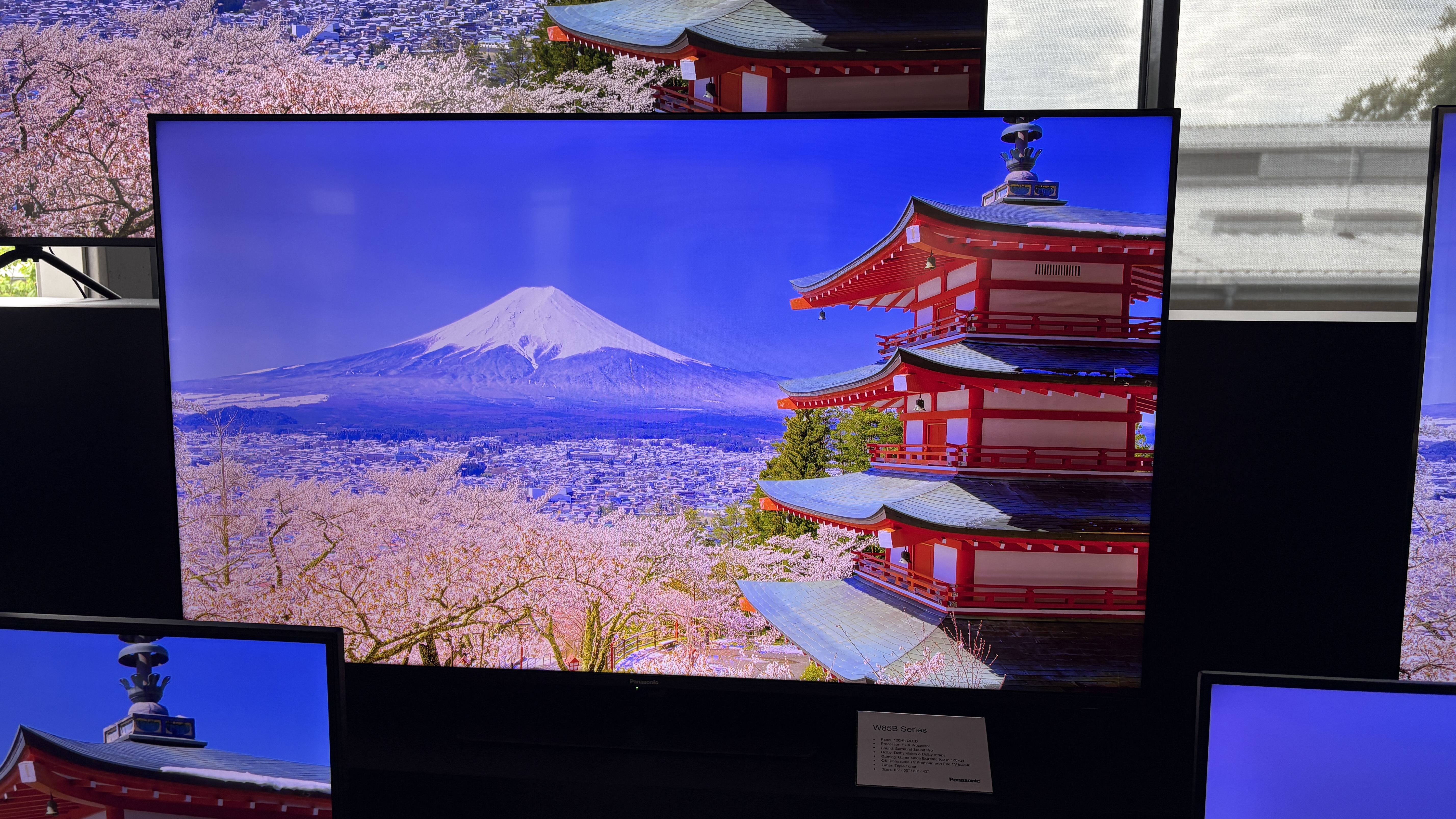 Panasonic TVs on a black show stand