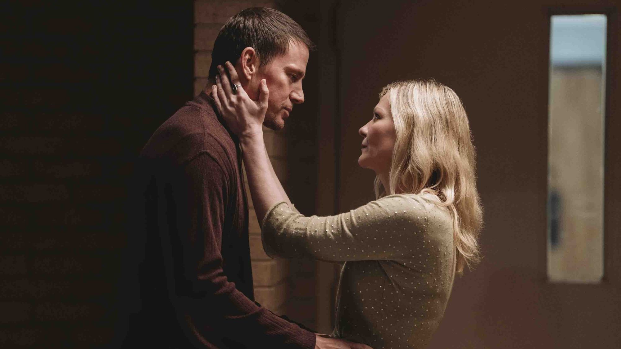 Channing Tatum and Kirsten Dunst look into each others' eyes in Roofman